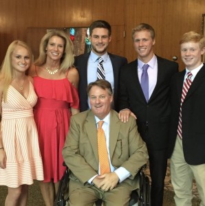 30 days after the stroke Tim, center, left the hospital for the first time to attend his goddaughter’s wedding with his family (left to right): Kaleigh, Tammy, Ryan, Jack, & Joey.